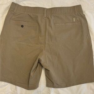 Under Armour golf shorts.